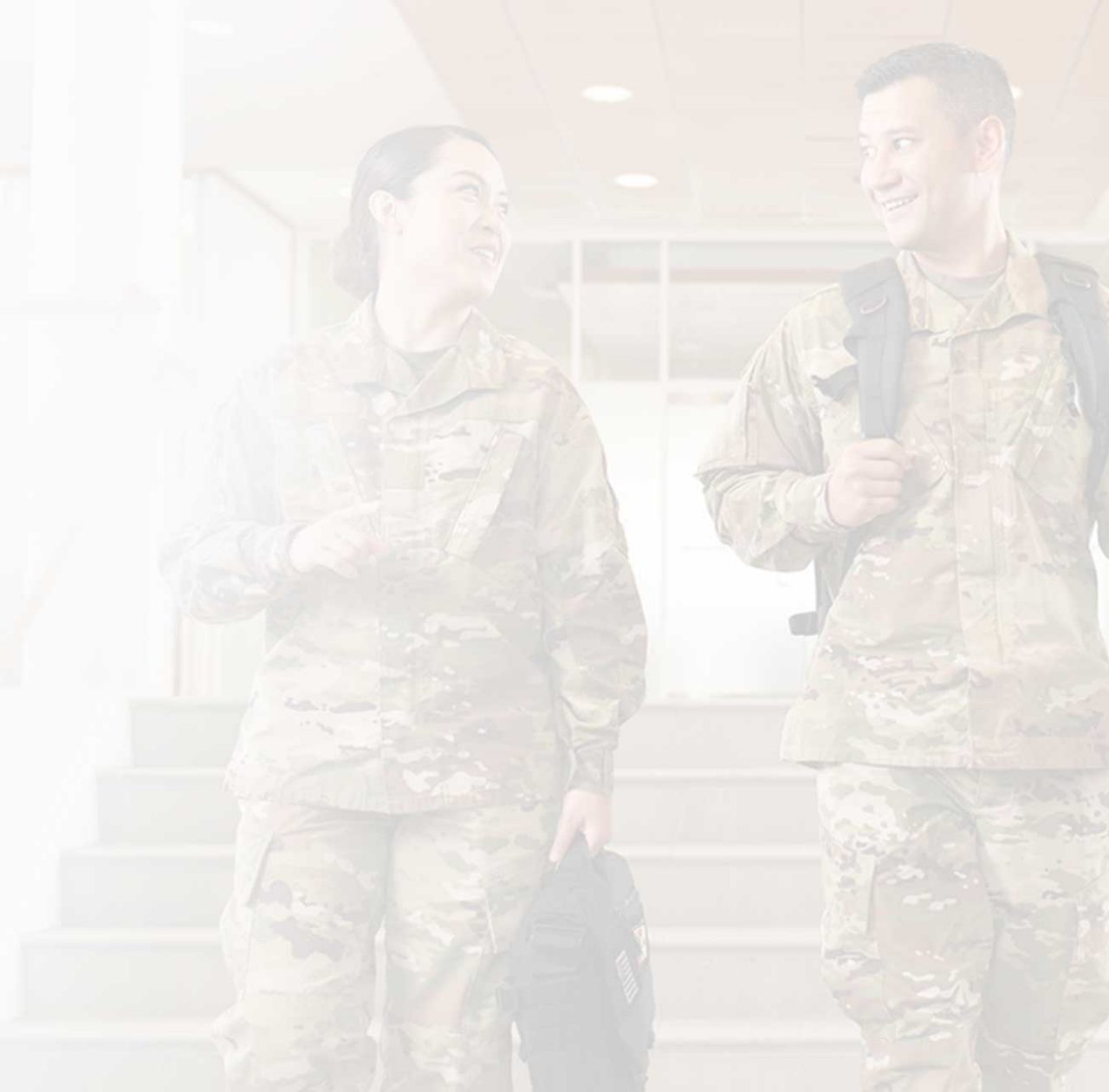 Two servicemembers walking and talking